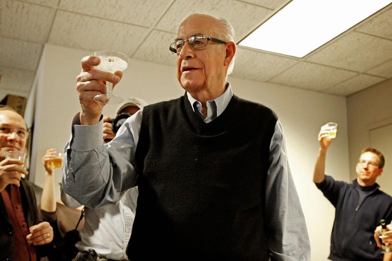 National Public Radio's Carl Kasell lifts a glass to toast his co-workers after delivering his last newscast at NPR December 30, 2009 in Washington, DC. A newscaster with NPR for 30 years, Kasell will take up the duty of roving ambassador for the network and continue his work on the game show Wait, Wait... Don't Tell Me!